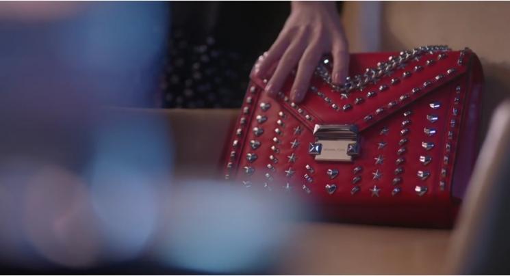 Whitney Handbags. (Youtube.com/Michael Kors)