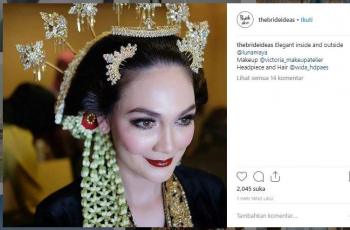 Luna Maya pakai gaun pengantin. (Instagram/@thebrideideas)