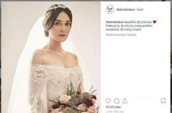 Luna Maya pakai gaun pengantin. (Instagram/@thebrideideas)