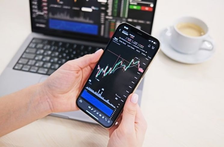 Ilustrasi investasi buat cewek gen z. (Unsplash.com/TabTrader.com)